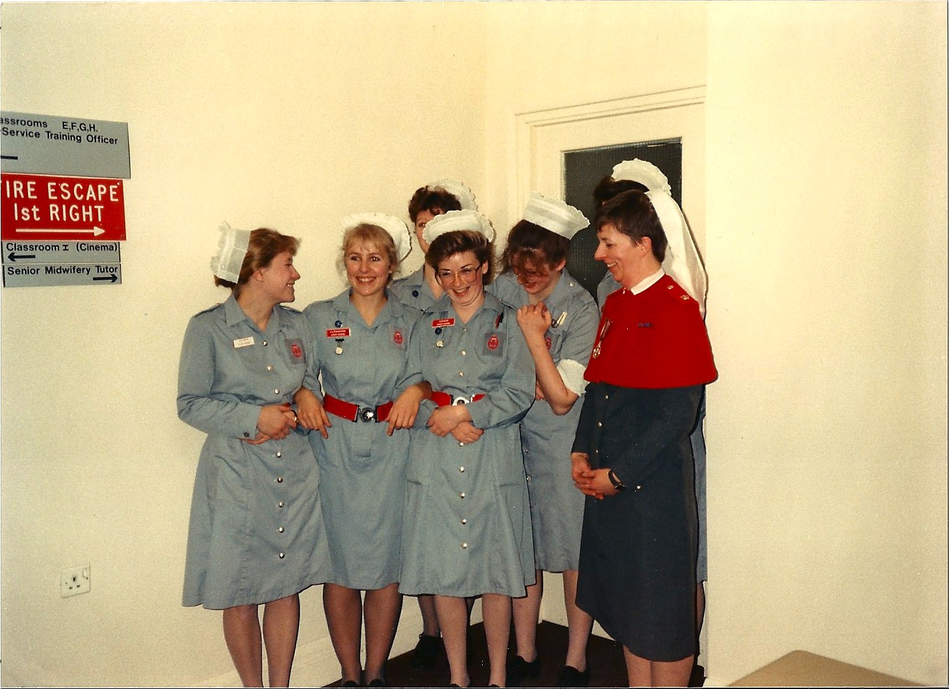 Six QARANC nurses in grey uniform and white caps at the presentation of RGN belts and badges, Cambridge Military Hospital, Aldershot, 1987